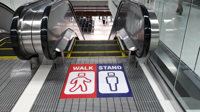 escalator etiquette stand on right walk on left