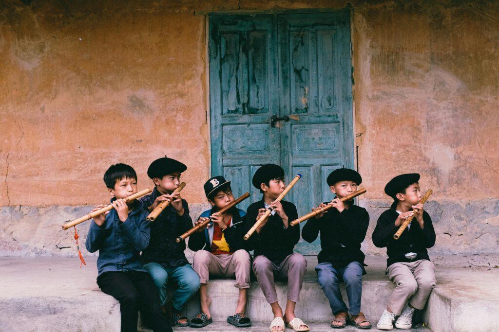 Photo by Thanh  Luu: https://www.pexels.com/photo/boys-playing-flutes-27772451/